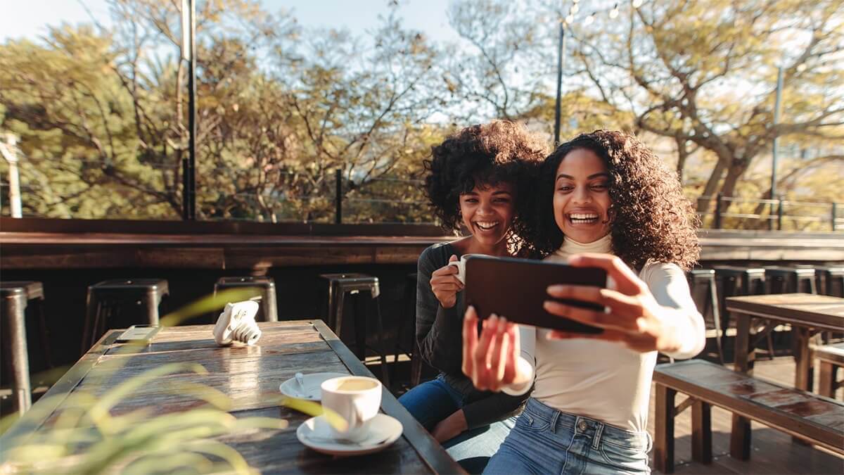 two-young-women-taking-selfies-and-having-fun