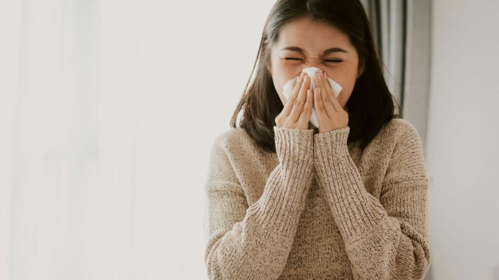 girl-blowing-her-nose