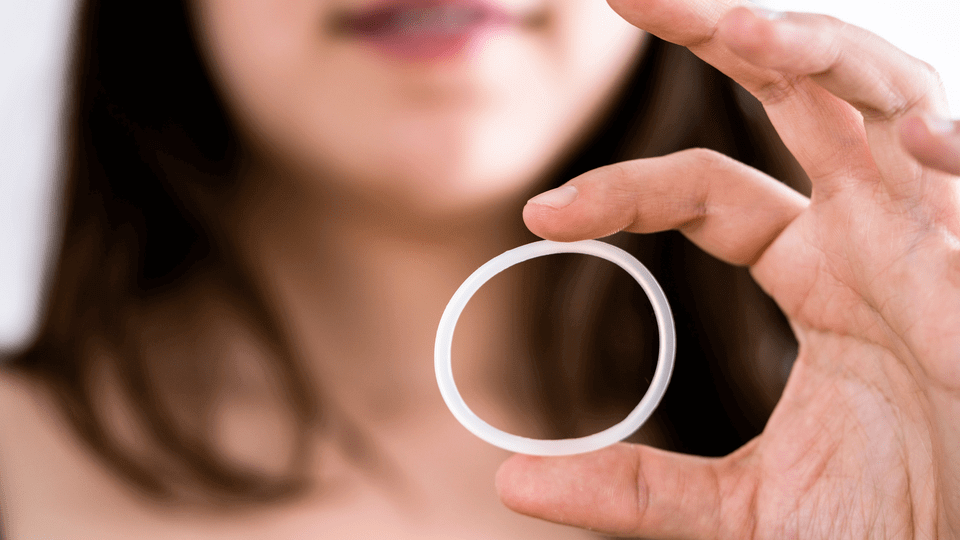 woman-holding-contraceptive-ring