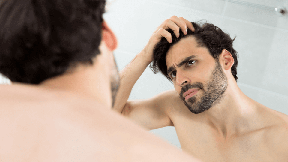 rsz_1hair_loss_3-min man-checking-receding-hairline-in-mirror