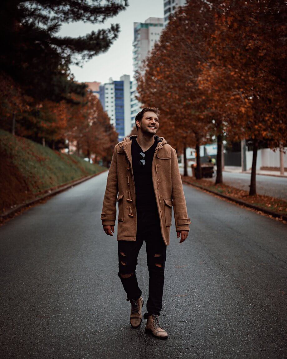 man-walking-down-the-street-in-autumn man-walking-down-the-street-in-autumn