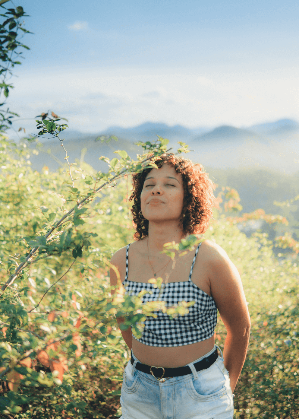 woman-outside-taking-a-deep-breath