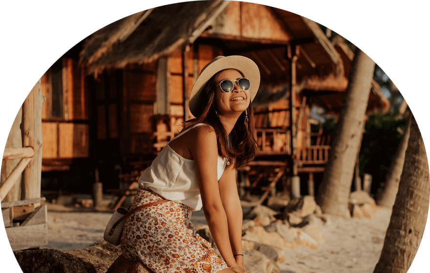 woman-enjoying-the-evening-sun-on-thai-beach