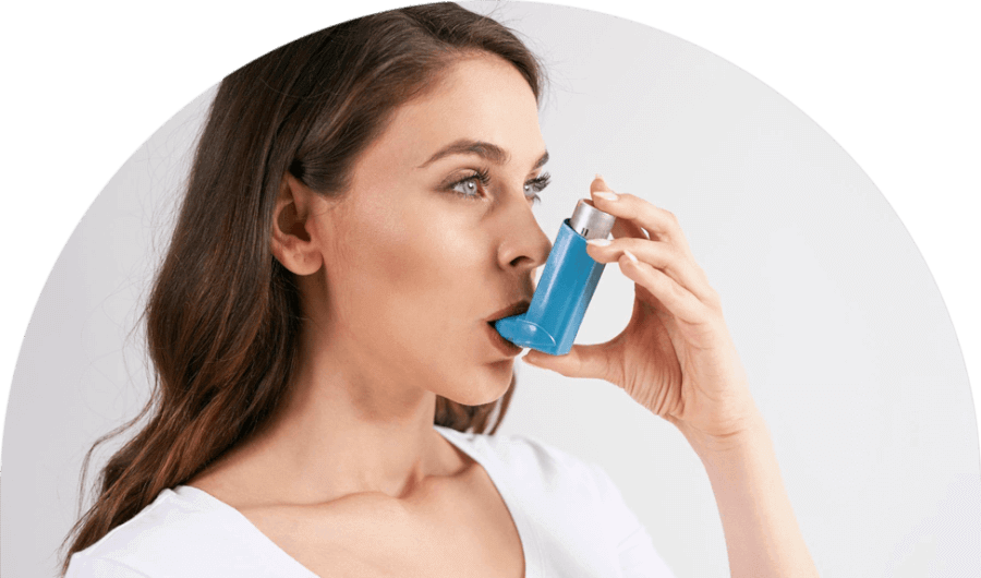 woman-using-reliever-inhaler