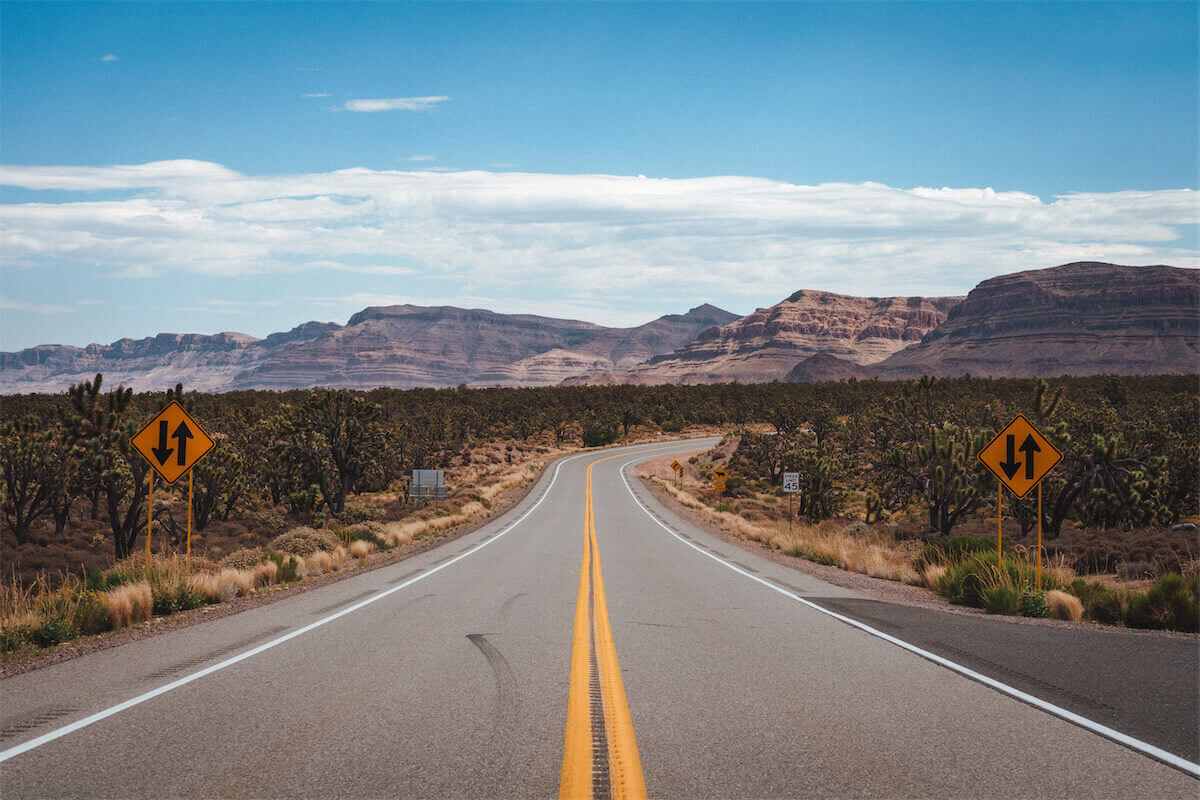 road-leading-into-a-mountain-range